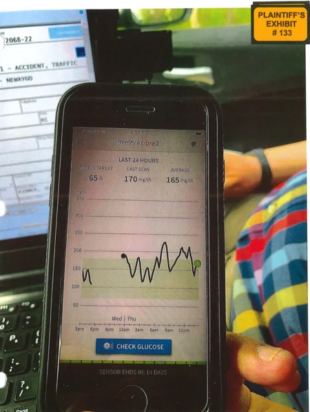 Trial Exhibit 133: Screenshot of FreeStyle Libre2 app the secured from the distracted driver. This app checks a diabetic's blood glucose (sugar) level when placed next to a sensor on the person's back of their arm.
